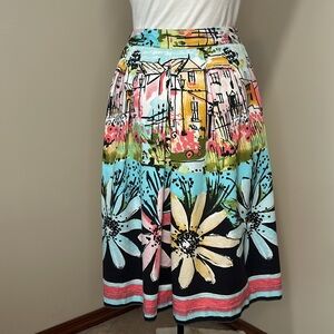 i.e. Skirt bright floral graphic knee length full / pleated skirt Size 4…
